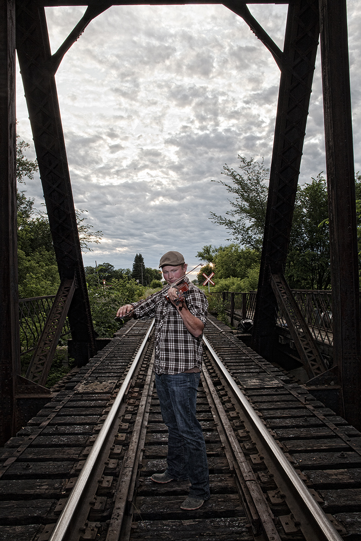 About the Series "I began shooting the series 7 years ago. The portraits depict musicians of all different walks of life with the purpose of exploring the...